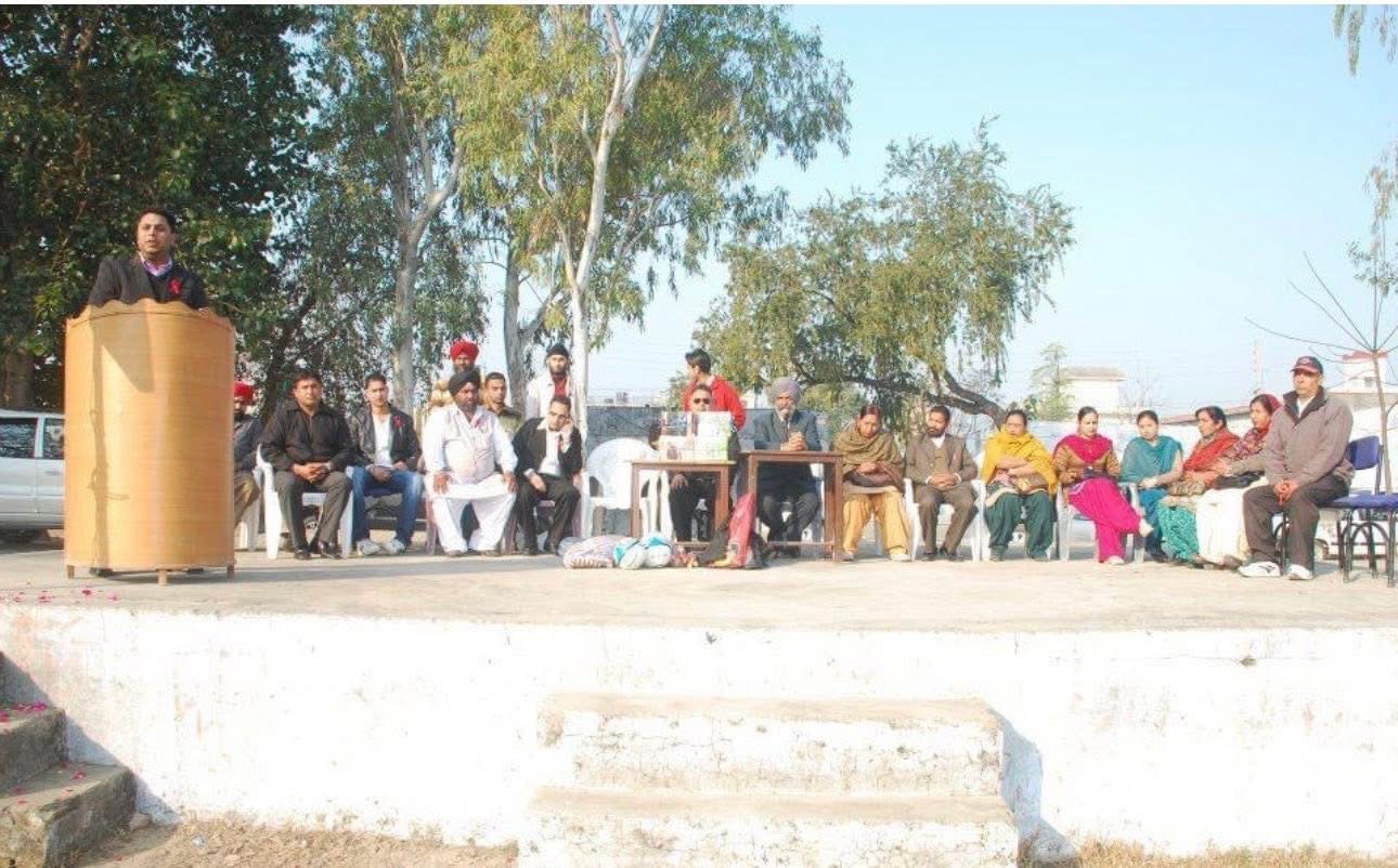 Varinder Singh and community members taking part in an early service program in Punjab